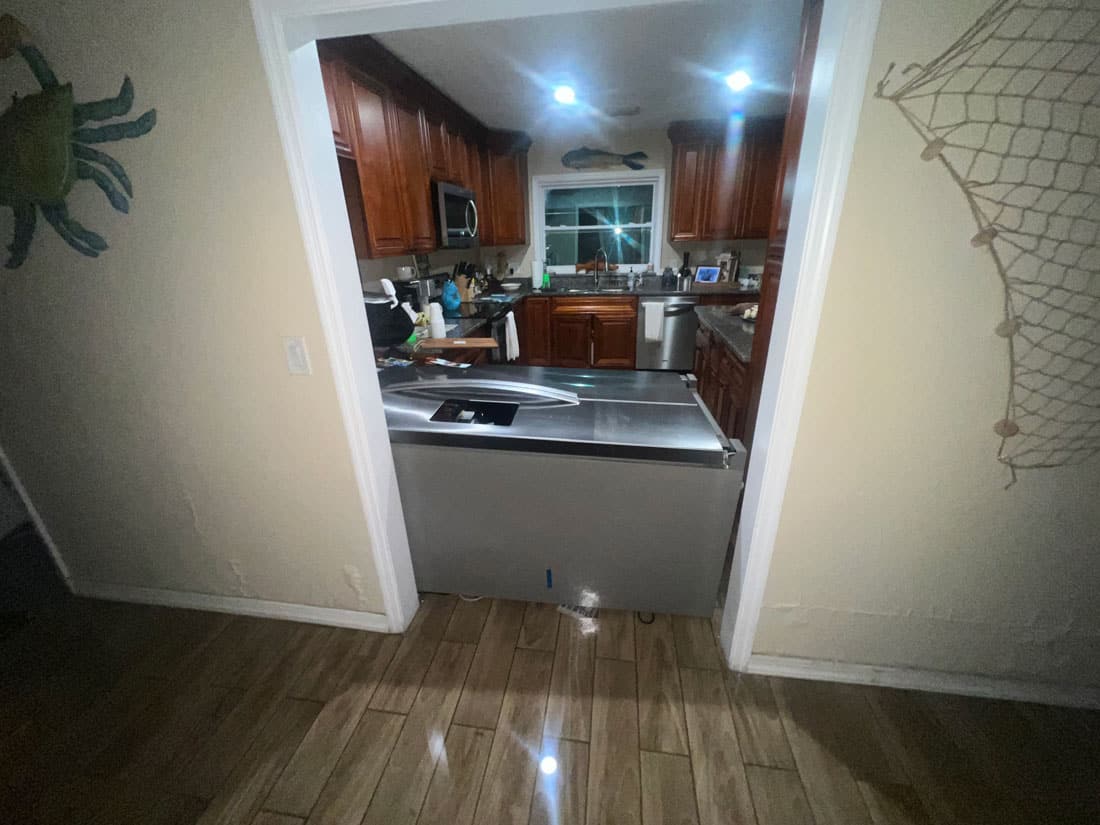 a flooded kitchen after a hurricane